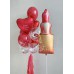 Композиция с губной помадой и фонтаном из красных шаров happy Women's day