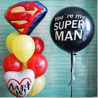 Сет из большого шара с надписью и фонтана с фигурным фольгированным шаром с эмблемой Супермен и фольгированного шара с рисунком и надписью в черно-белых и красно-желтых тонах любимому